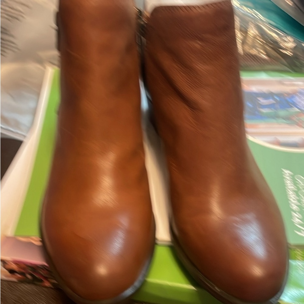 LUCKY BRAND TOFFEE COLOR BOOTIES. I THINK THAT THEY MAY HAVE BEEN WORE ONCE.